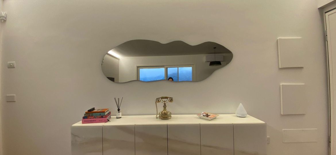 Specchio su misura sagomato realizzato da vetrai a Firenze